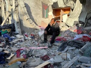 A-man-looks-on-at-the-site-of-an-Israeli-strike-on-a-house-amid-the-ongoing-conflict-between-Israel-and-the-Palestinian-Islamist-group-Hamas-in-Rafah-in-the-southern-Gaza-Strip-January-18-2024