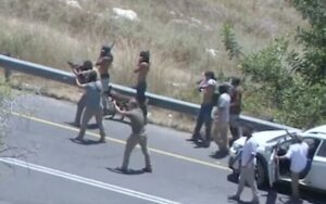 Screenshot-from-a-video-of-settlers-firing-at-the-West-Bank-village-of-Umm-Safa-on-June-24-2023.jpeg