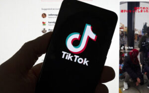 Illustrative: The TikTok logo is seen on a mobile phone in front of a computer screen which displays the TikTok home screen, March 18, 2023. (AP/Michael Dwyer)